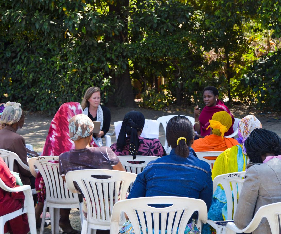 Local women listen to a presentation about human rights on one of our Law internships abroad.