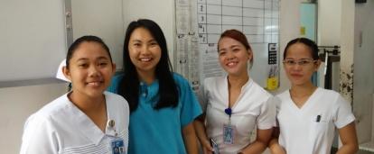 Female doctors in the Phillipines with their recent medical internship student. 