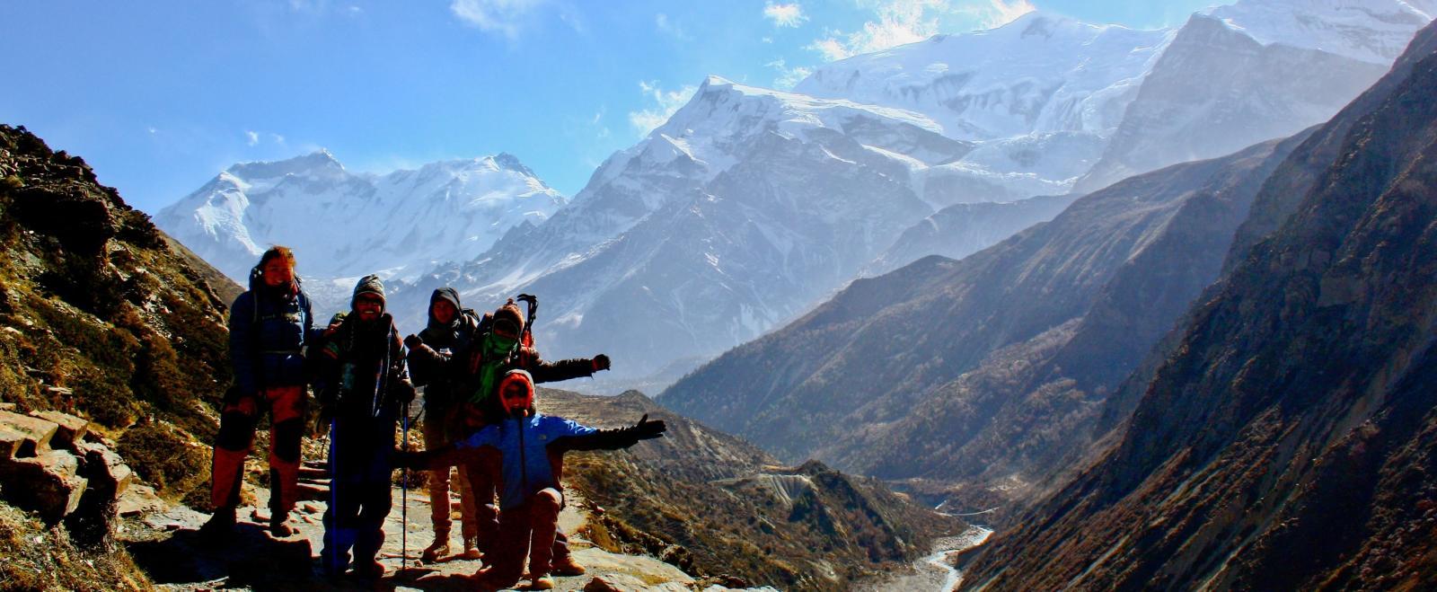 Projects Abroad volunteers climb the snowy Himalayan Mountains while volunteering in Nepal.