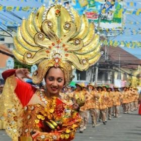 Projects Abroad volunteer work in the Philippines is ongoing as the locals celebrate a festival in the streets.