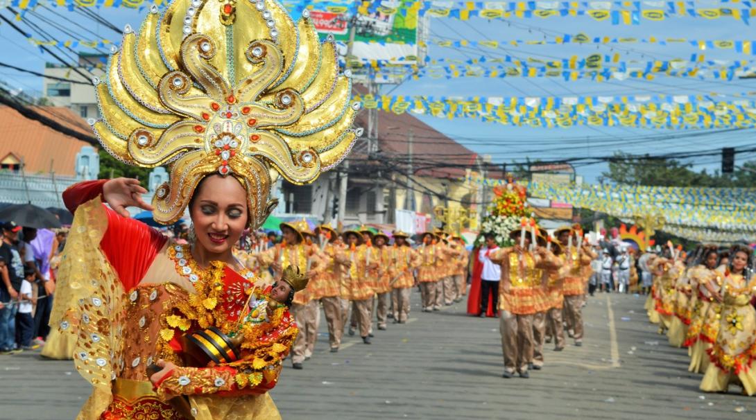 Local Filipinos perform traditional songs and dances at the Sinulog festival in the Philippines