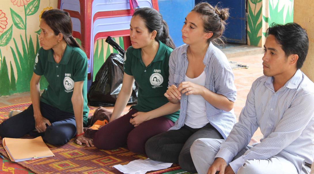 Women empowerment volunteers hold a meeting for female business owners in Cambodia.