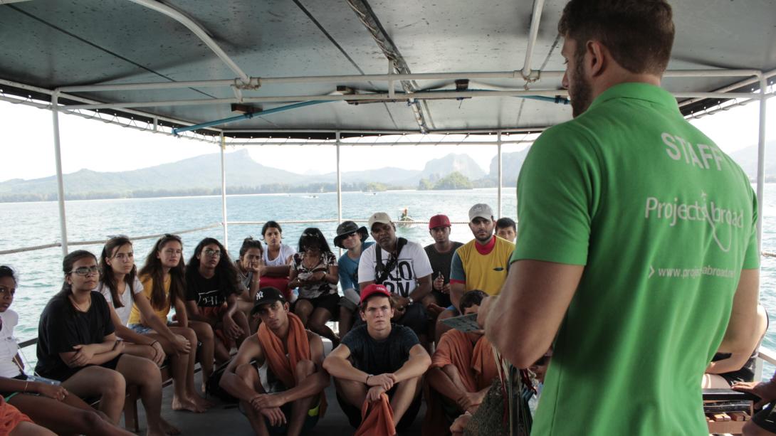 Projects Abroad staff member runs volunteers through safety procedures in Thailand.