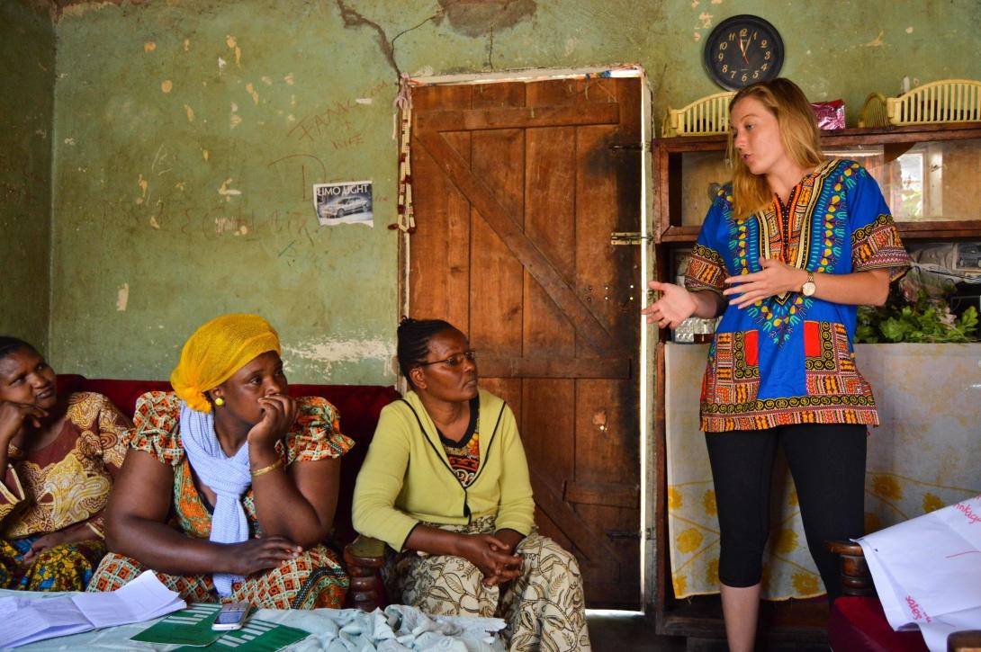 A Canadian micro-finance volunteer gives a lesson to local women in Arusha, Tanzania.